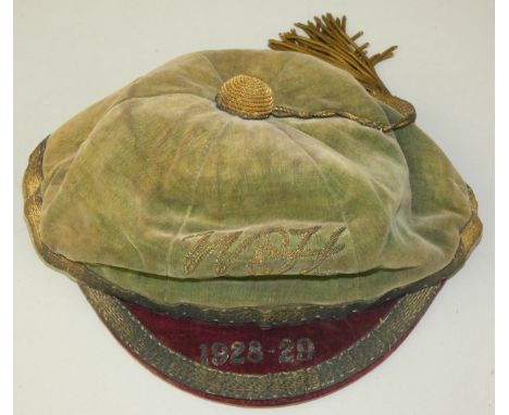 A rugby sports cap with tassle, marked  W &amp; H Rugby Football Union for 1928- 29 (probably for Worcester &amp; Hereford).