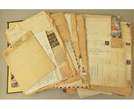 A large family album put together by the widow of United States Navel rating Earl J. Lee, who was killed when the ammunition 