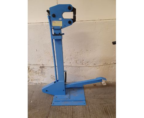 A Metz tools shrinker stretcher metal fabrication tool.