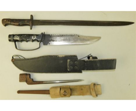 A 1907 pattern Lee Enfield bayonet by Wilkinson without scabbard, a Lee Enfield MK4 spike bayonet complete with welding frog 