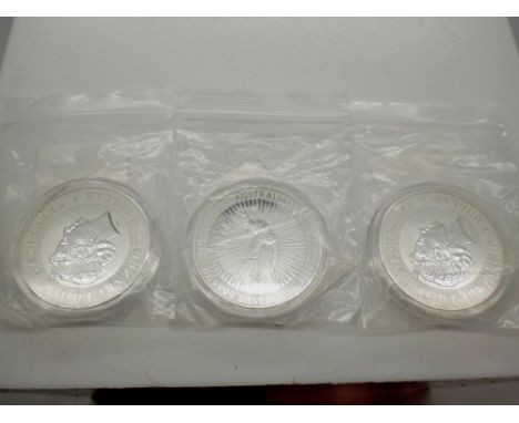 Three restrike Australian Kangaroo base metal 1 ounce coins. UK P&amp;P Group 0 (£6+VAT for the first lot and £1+VAT for subs