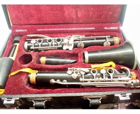 Clarinet in a velvet lined hard case with cloth and reeds. UK P&amp;P Group 2 (£20+VAT for the first lot and £4+VAT for subse