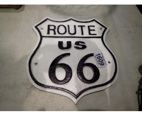 Cast iron Route 66 sign, H: 29 cm. UK P&amp;P Group 2 (£20+VAT for the first lot and £4+VAT for subsequent lots) 