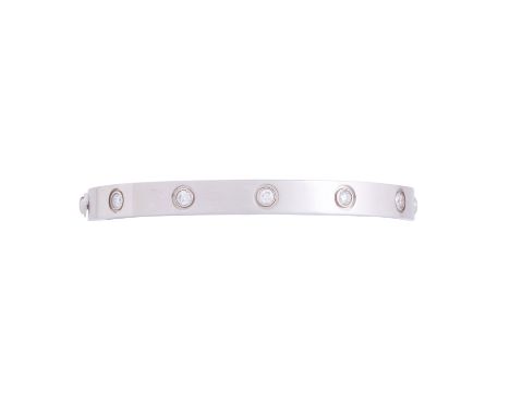 CARTIER Armreif "Love" mit 10 Brillanten von zus. ca. 0,96 ct mit guter Farbe und Reinheit, WG 18K 30,3 gr., NP €19.600.-, Gr