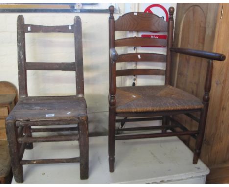 Rustic stained bar back child's chair, together with a 20th Century elm ladder back armchair on rush seat. (2)(B.P. 24% incl.