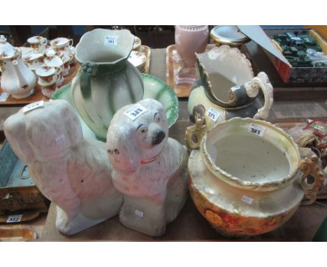 Collection of pottery items to include: jug and basin set; two handled floral planter; pair of Staffordshire fireside spaniel