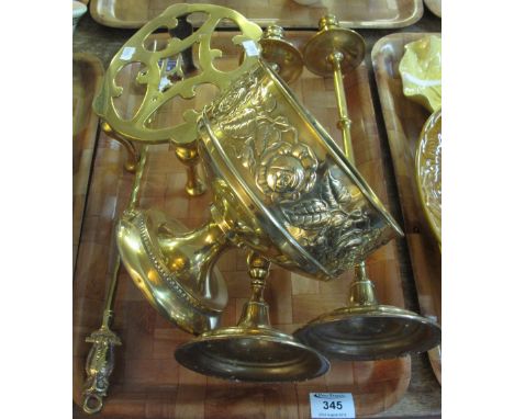 Tray of brass ware to include: pair of tall candlesticks; relief rose design pedestal bowl; trivet stand and a toasting fork.