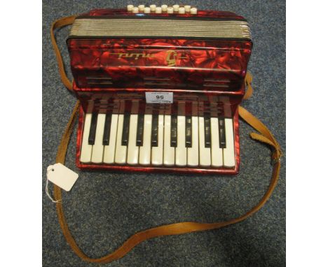 'Mini' red marbled finish piano accordion.(B.P. 24% incl. VAT)