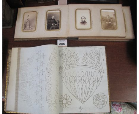 19th Century leather bound sketch book, basically full of sketches for embroidery and lace work, together with a leather boun