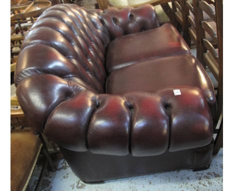 Modern leather, arched back, two seater sofa.(B.P. 24% incl. VAT)