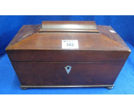 19th Century mahogany sarcophagus shaped tea caddy with fitted interior and mixing bowl. (B.P. 24% incl. VAT)
