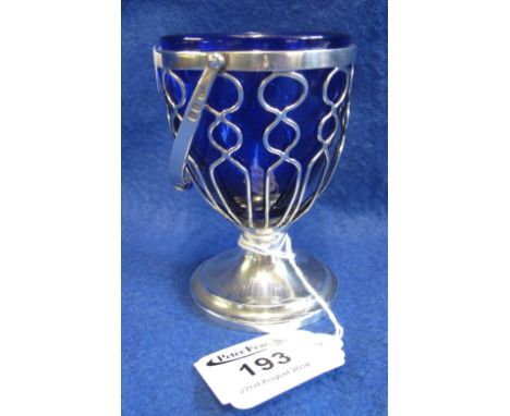 Britannia silver wirework urn shaped, pedestal sucrier or salt with swing handle and blue glass liner, maker's initials: M.F.