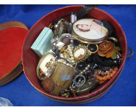 Leather collar box containing a large collection of costume jewellery and other items to include: watches, compacts, snuff bo