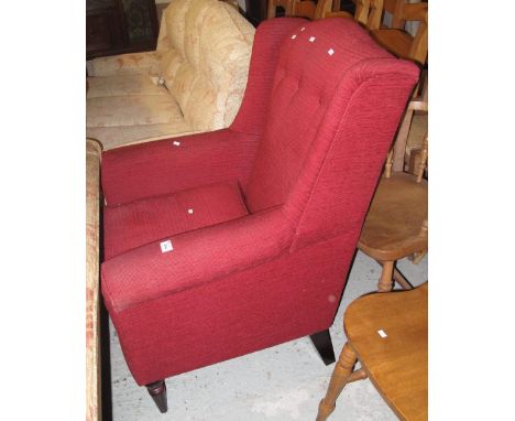 Modern red upholstered, button back, wing type chair.(B.P. 24% incl. VAT)