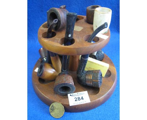 Circular smokers stand, together with a collection of assorted smoking pipes, various, including unused Meersham pipe with am