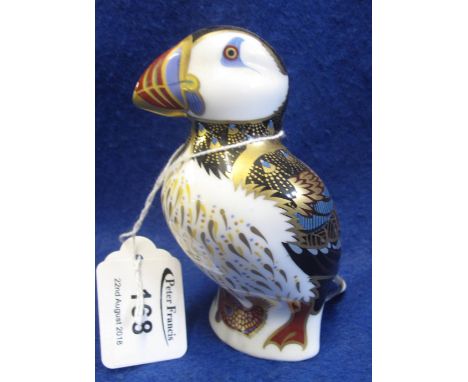 Royal Crown Derby bone china paperweight 'Puffin', silver button, possibly a second.(B.P. 24% incl. VAT)