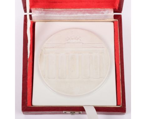 Cased Porcelain Plaque of Berlin Interest, white porcelain plaque depicting the Brandenburg gate with BERLIN underneath. Hous