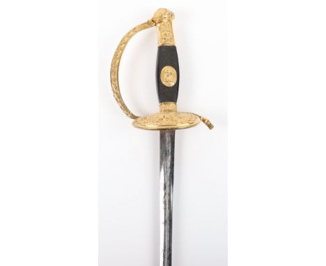 19th Century French Dress Sword, slender triangular section blade signed Ve A K &amp; F etched with small trophies, ormolu hi