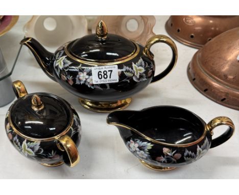 A vintage Sadler black glazed ceramic tea set with gilded highlights &amp; floral decoration COLLECT ONLY