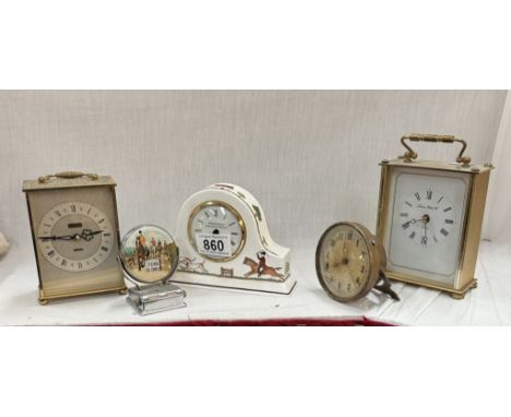 A vintage perpetual calendar with hunting scene &amp; a selection of clocks