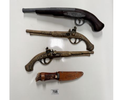 A German Salzburg hunting knife, A pair of brass wall hangings &amp; an artificial flintlock pistol