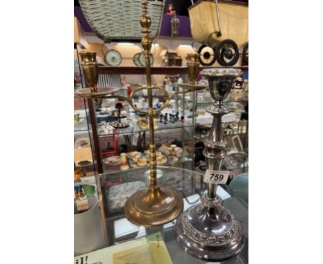 An adjustable brass twin candlestick &amp; a silver plated candlestick