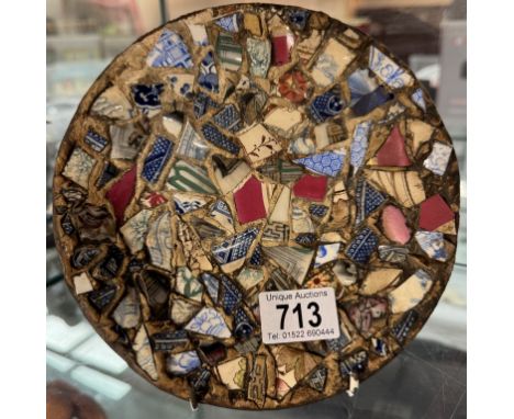 A vintage tin plate with Who Killed Cock Robin Rhyme on reverse. Front has been decorated in mosaic style with ceramic pieces