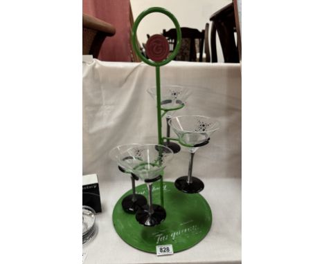 A Charles Tanquarey London Gin / cocktail standWear to lettering on base. Plastic drinking glasses in good condition, stand h