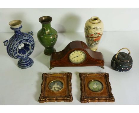 An assortment of ceramics and other ephemera, including a Japanese baluster vase, a waisted cloissone vase, a small mantel cl