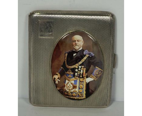 A silver presentation card case, Birmingham 1957, with Masonic Presentation from Bounds Green Lodge, 4406, and an applied ena