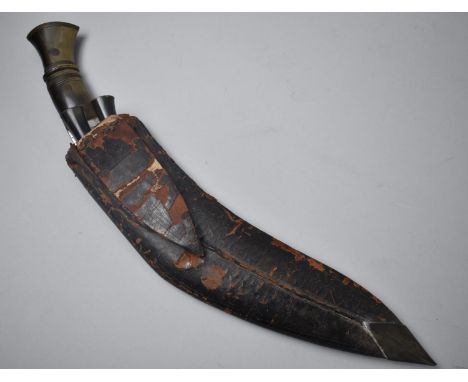 A Vintage Kukri Knife in Leather Scabbard with Two Daggers 