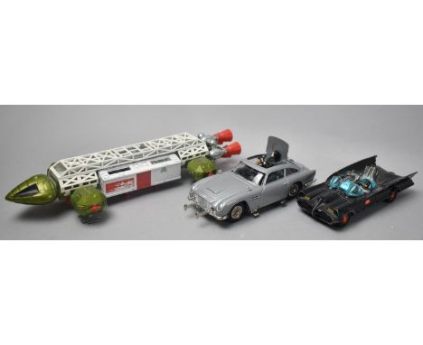 An Unboxed Corgi Toys Batmobile and Aston Martin DB5 together with a Dinky Toys Eagle 