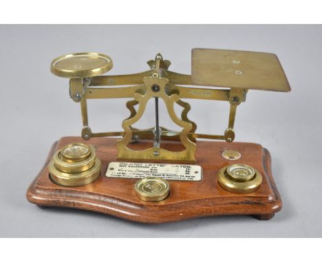 A Vintage Brass Postage Scale and Weights on Wooden Plinth, 20cms Wide 