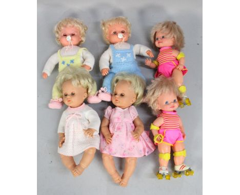 A Collection of Six Dolls to include two Clockwork Roller Skating Girls 