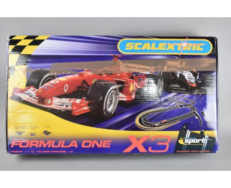 A Boxed Scalextric F1 Motor Racing Set, Ferrari and Mclaren Mercedes with Extra Track 