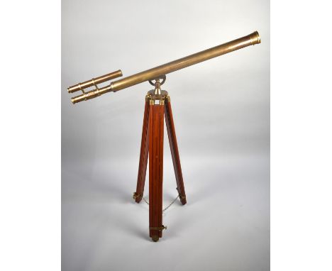 A Reproduction Brass Telescope on Brass Mounted Wooden Tripod, 96cms Long 
