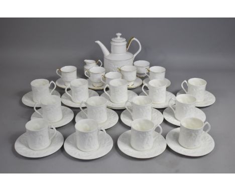 A Coalport Dragon Pattern Coffee Set by Donald Brindley, Decorated in Relief with Dragons to comprise 13 Cans and 14 Saucers 