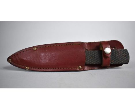 A Vintage Boot or Throwing Knife in Leather Sheath, Made 440 Steel with Python Carved Scales, 18.5cms Long 