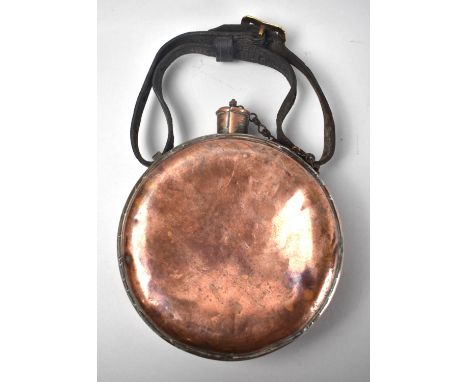 A 19th century Circular Copper Cavalry Water Flask or Bottle with Leather Strap, 17cms Diameter 