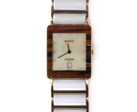 A ladies' ceramic Rado 'Diastar' quartz bracelet watch,case 24mm x 30mm, a mother of pearl dial, with gilt dot hour markers a