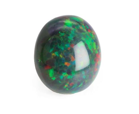 An unmounted oval shaped black opal,19.20mm x 21.50mm x 11.50mm, 23.70ctCondition ReportSurface scratches and marks. Some pit