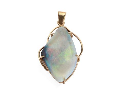 A gold free form opal pendant,a polished free form opal, claw set within a scrolling wire frame, to a tapered bale. Marked 14