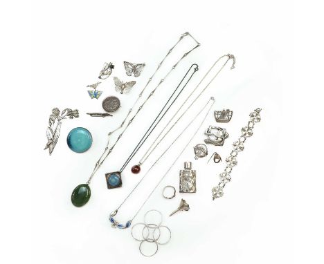 A collection of silver jewellery, to include a hallmarked silver mounted nephrite jade pendant and three other pendant neckla