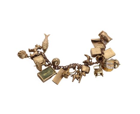 A 9ct gold charm bracelet,a solid double curb link bracelet to a bolt ring, 185mm long, suspending twenty one charms, to incl