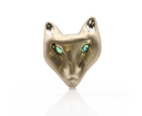 A white gold fox mask brooch, the stylised fox's face with textured finish all over apart from the polished ears, the eyes se