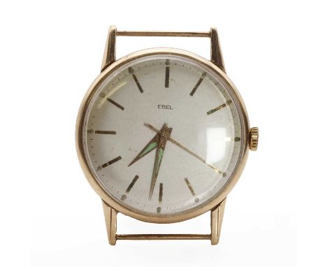 A 9ct gold Ebel mechanical watch head, 33mm case, with a silvered dial with baton indicators, luminous hands, manual winding 