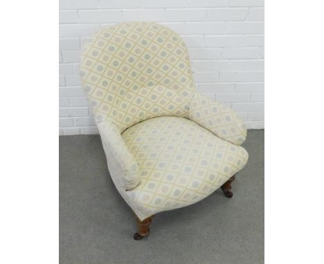 Upholstered armchair with mahognay legs and ceramic castors, 58 x 80 x 65cm 