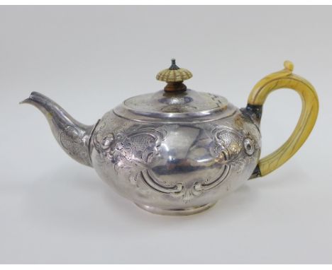 Regency silver teapot, J Wrangham &amp; William Moulson,  London 1822, of squat form with c scroll and rose bud pattern, ivor