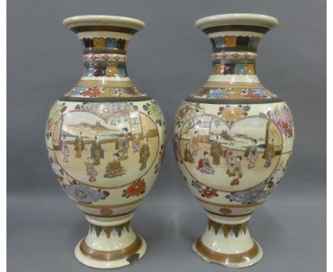 Pair of Japanese earthenware baluster vases, painted with warriors, losses to the foot rims, 42cm high (2) 