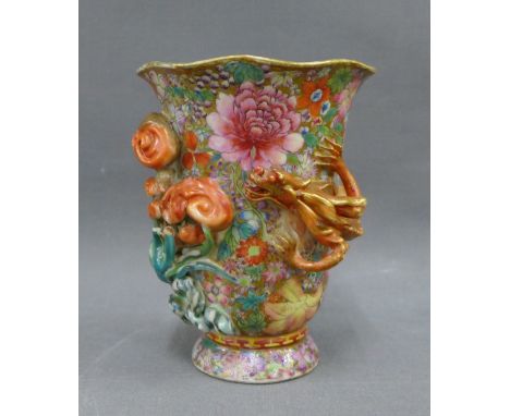 Chinese millefiore vase applied with an orange glazed dragon and foliage, with a red Qianlong seal mark to the base but likel